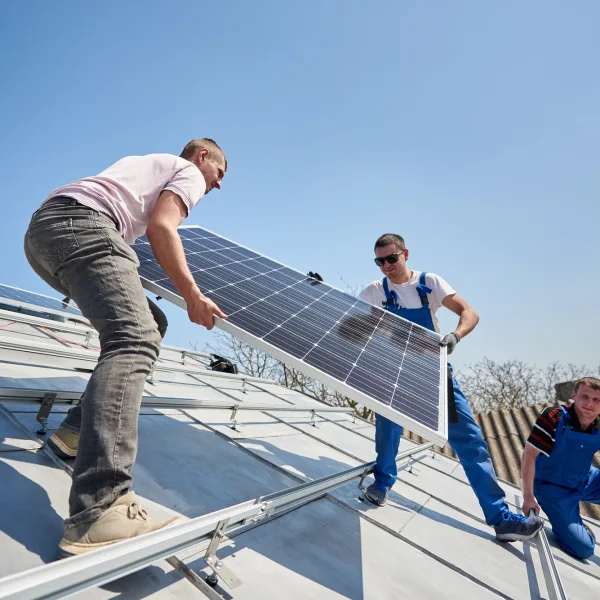 Installing solar photovoltaic panel system on roof of house